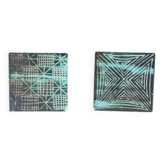 Pair of Robert Picault ceramic trivets with geometric patterns