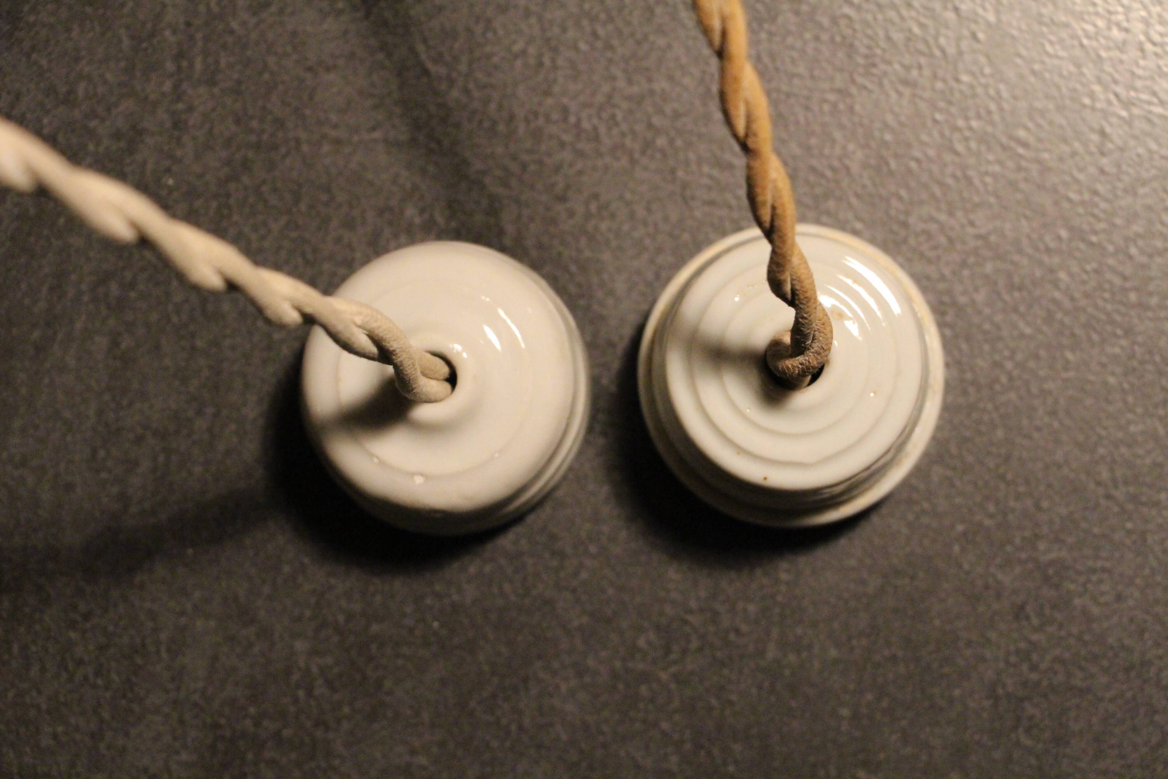 Set of two Art Deco pendant lamps in pink and gold glass