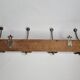 Antique wall-mounted coat rack in wood and metal with 4 hooks, 66 cm