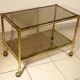 Serving trolley, table on wheels in "bamboo" brass