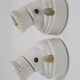 Duo of white ceramic wall lamps