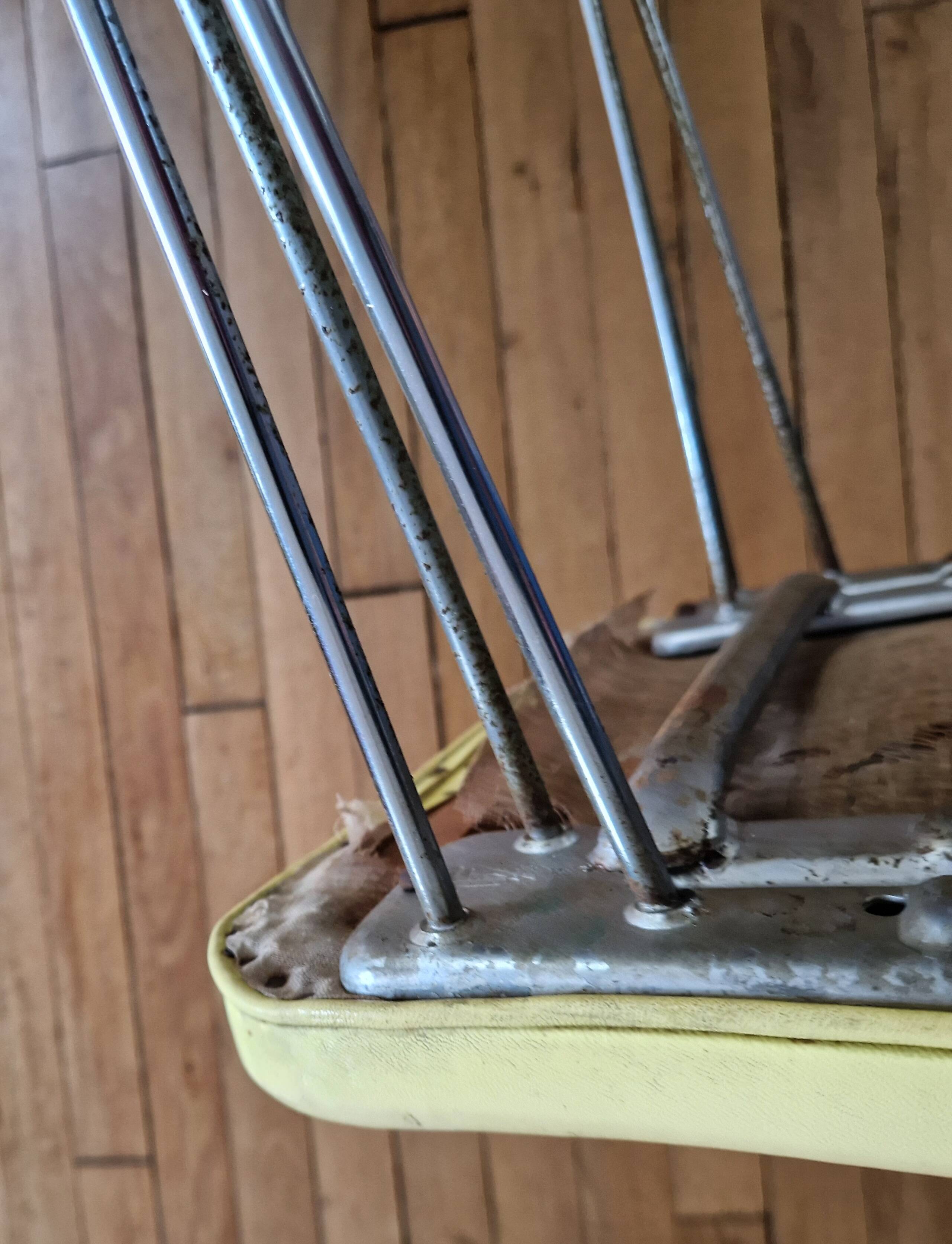 Vintage yellow leatherette stool from the 1950s