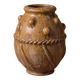 Glazed terracotta urn with protrusions and cordons.