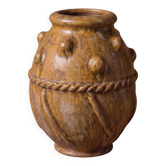 Glazed terracotta urn with protrusions and cordons.