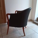 Pair of leather and wood armchairs in the Umberto Asnago style.