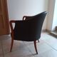 Pair of leather and wood armchairs in the style of Umberto Asnago.