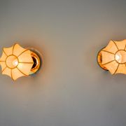 Pair of "cocoon" wall lights, resin and pine, Italy, 1970