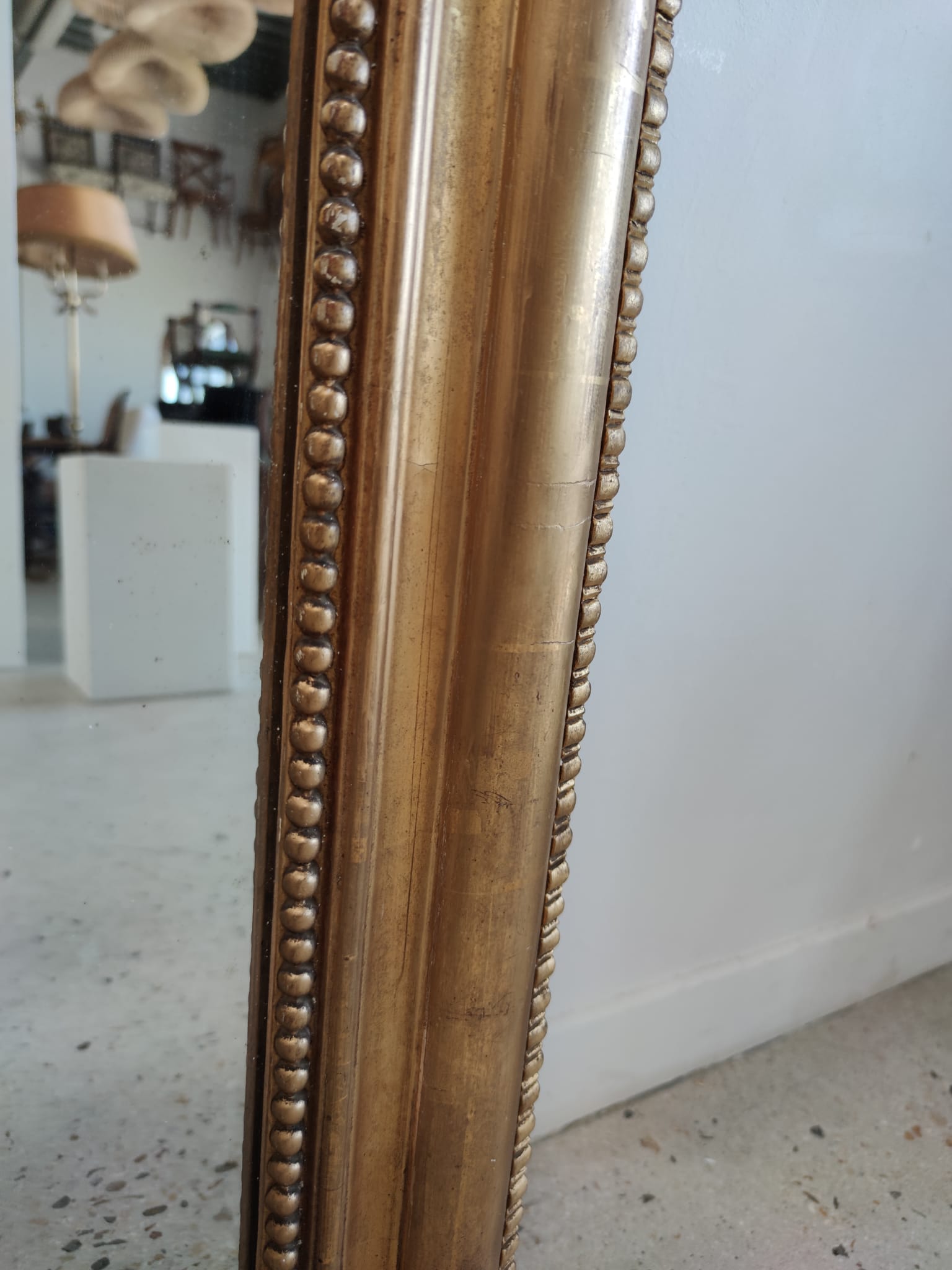 Louis Philippe gilded mirror with gendarme hat nineteenth H:130cm