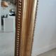 Louis Philippe gilded mirror with gendarme hat nineteenth H:130cm