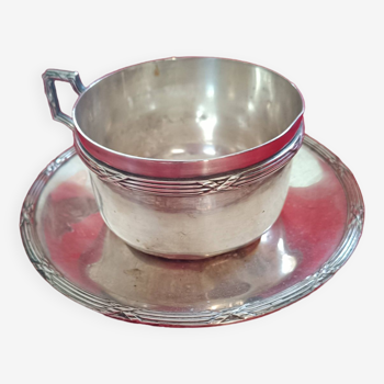 Silver-plated cup and saucer.