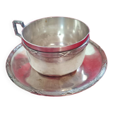 Silver-plated cup and saucer.