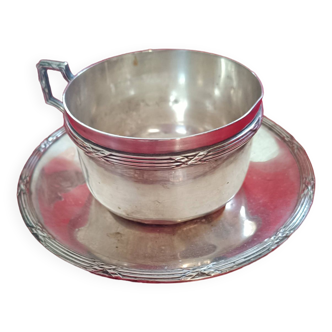 Silver-plated cup and saucer.