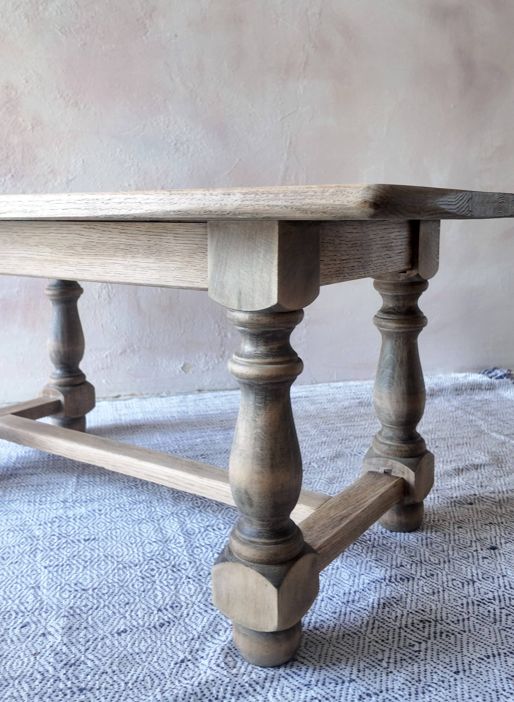 Old farmhouse coffee table in solid oak - turned legs and stretcher.
