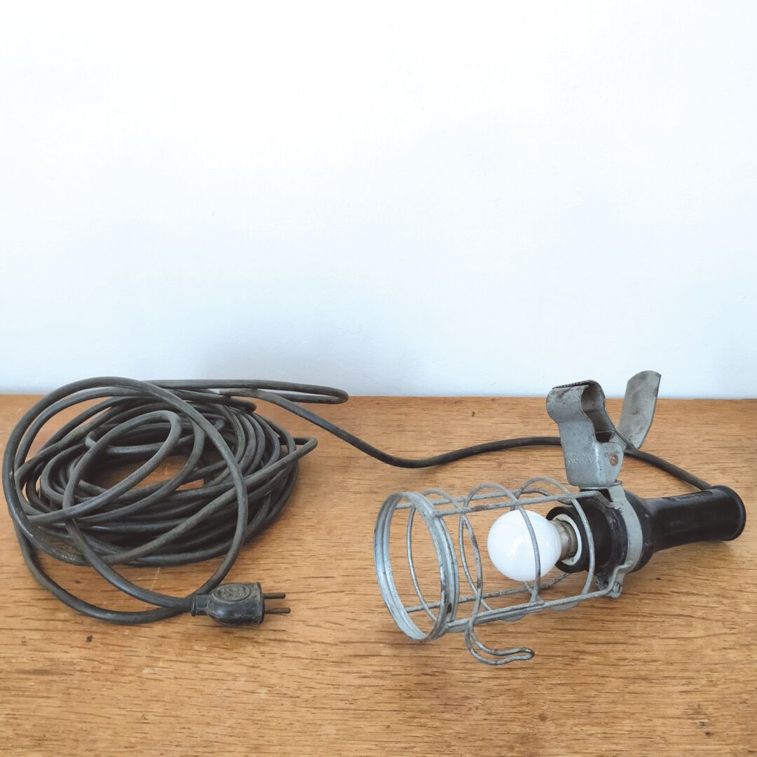 Black industrial atrow walking lamp