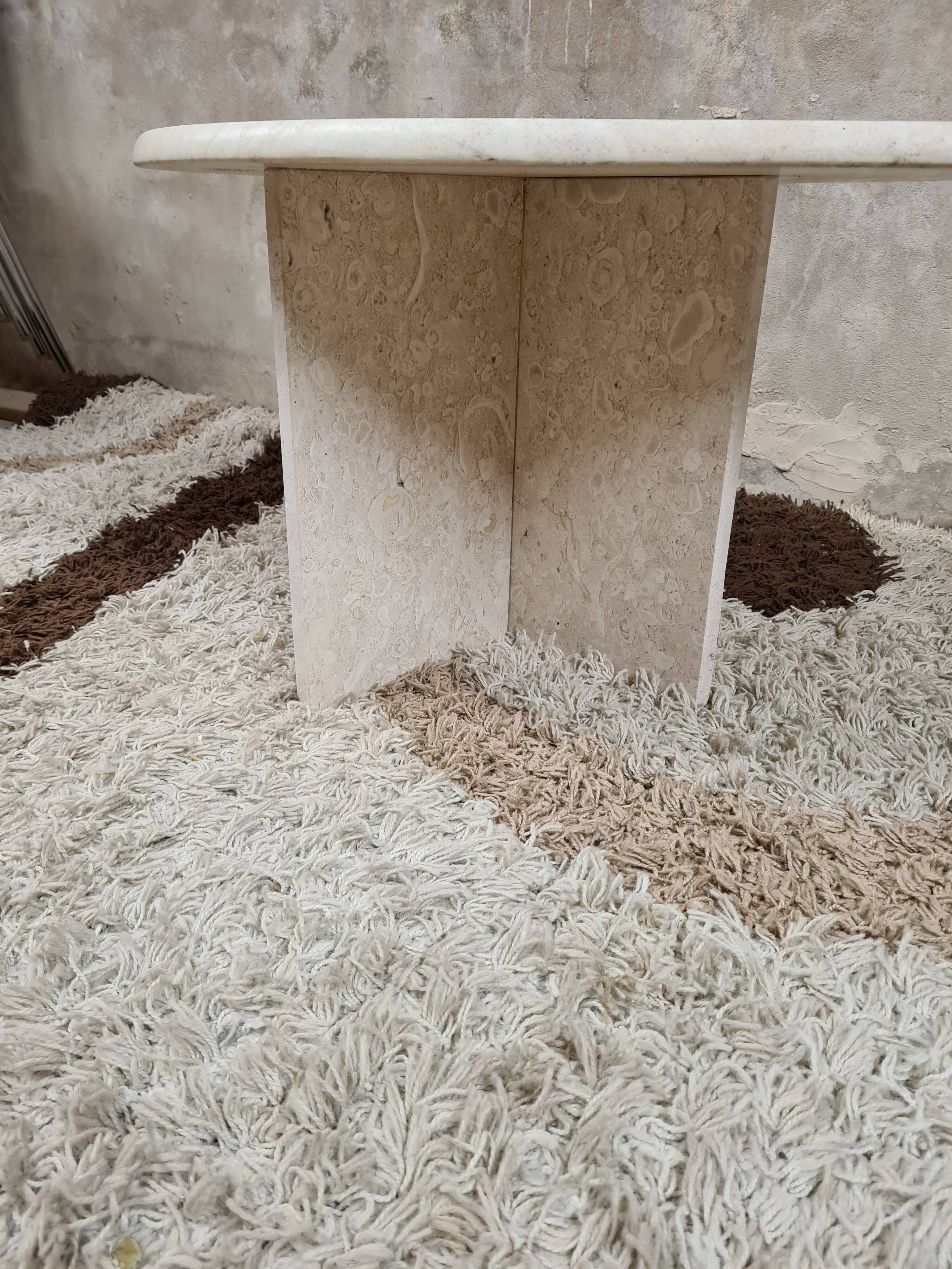 Travertine drop-shaped coffee table