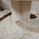 Travertine drop-shaped coffee table