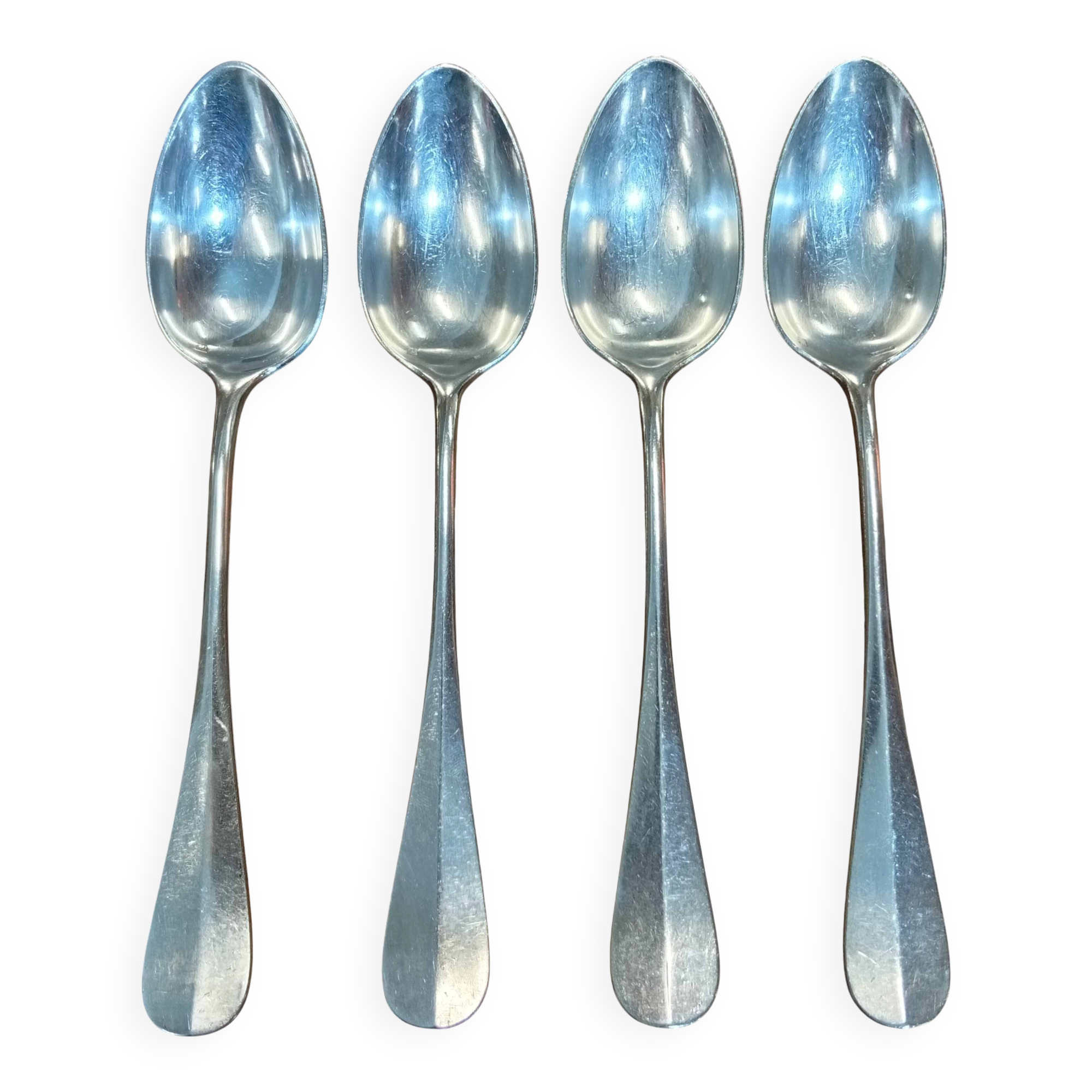 Set of 4 large spoons in the Vieux Paris style in silver-plated metal.