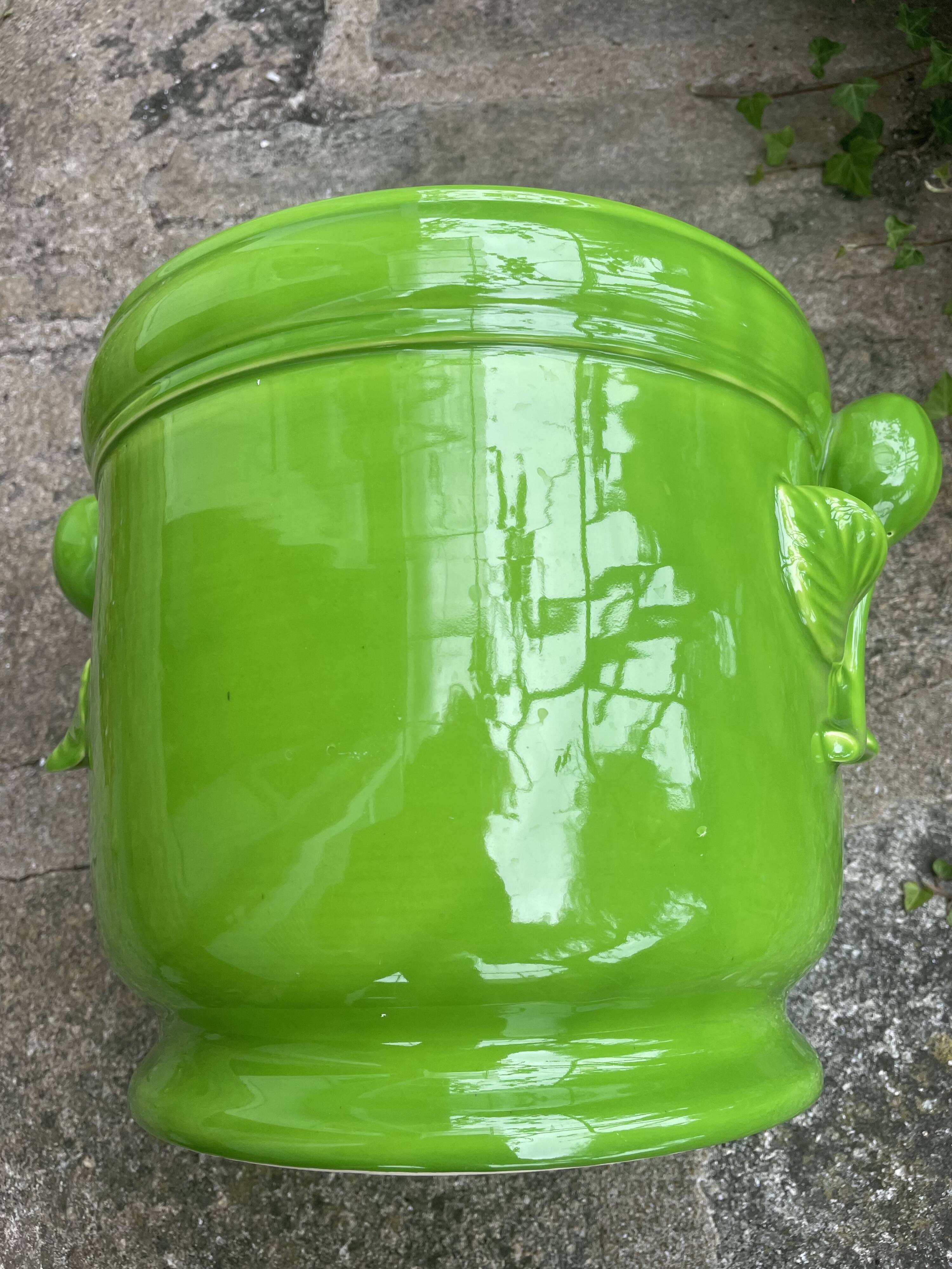 Glazed green pot cover in the style of Moreau Bourg earthenware