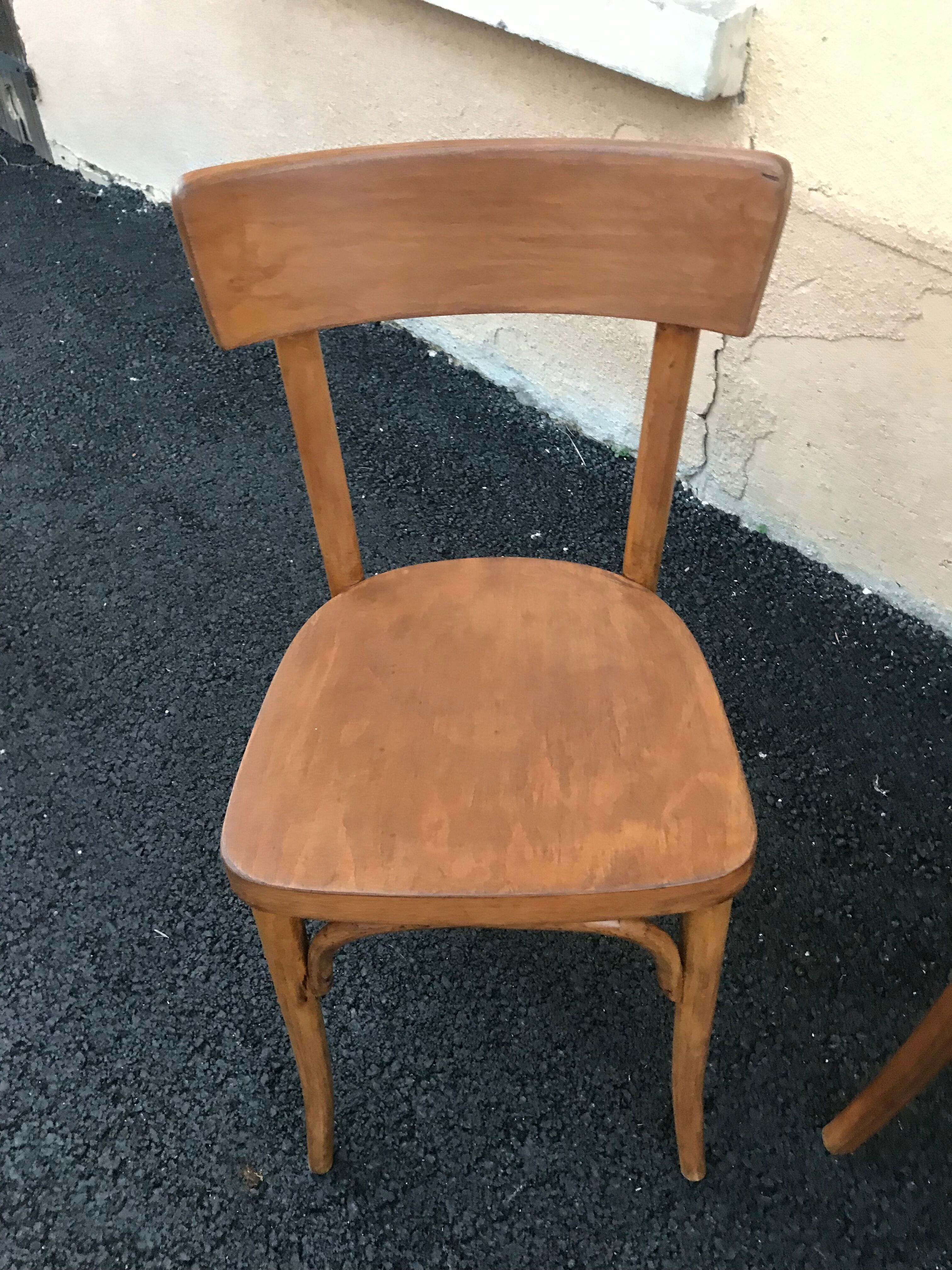 Mismatched bistro chairs Baumann