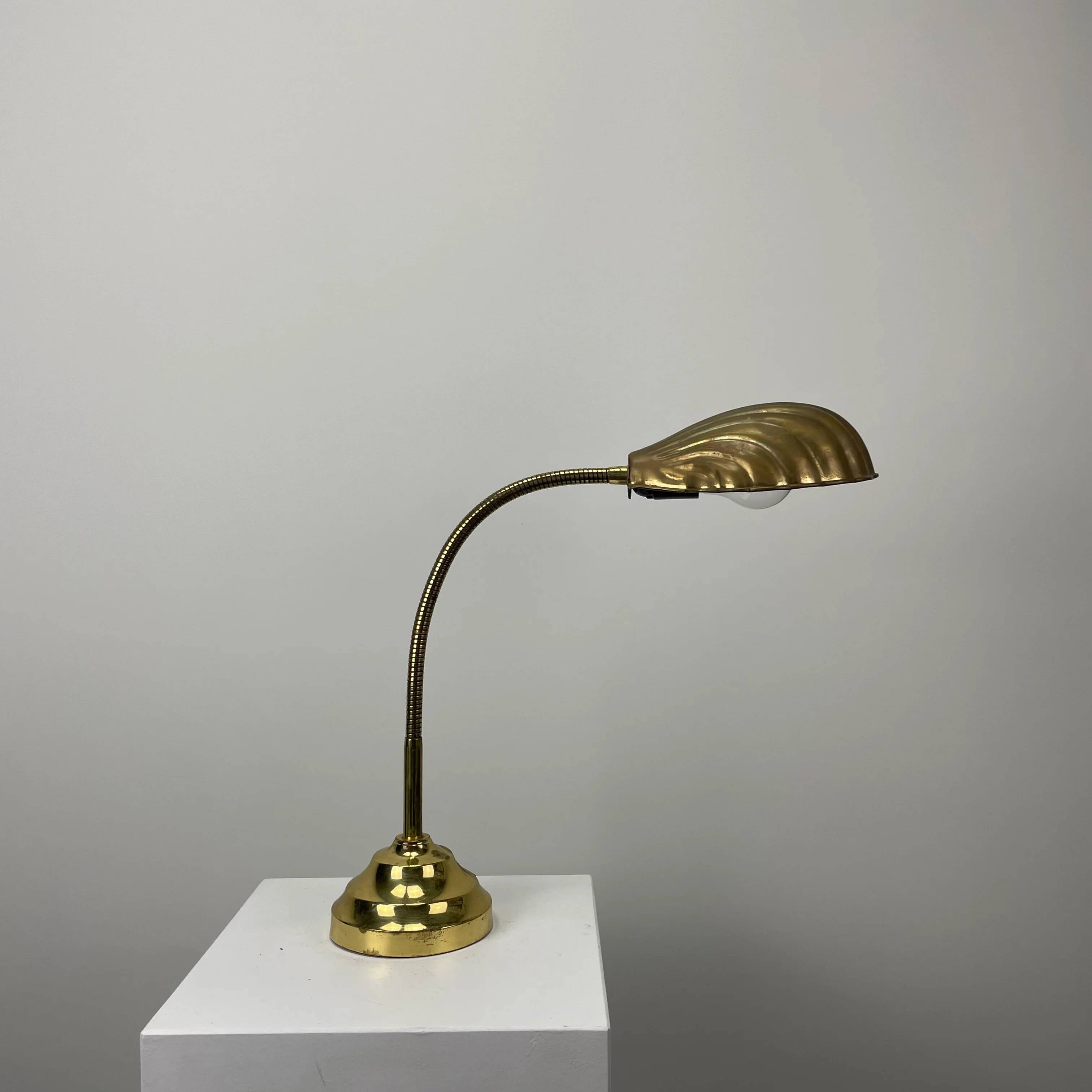 French table lamp in brass with a shell-shaped shade from the 1950s.