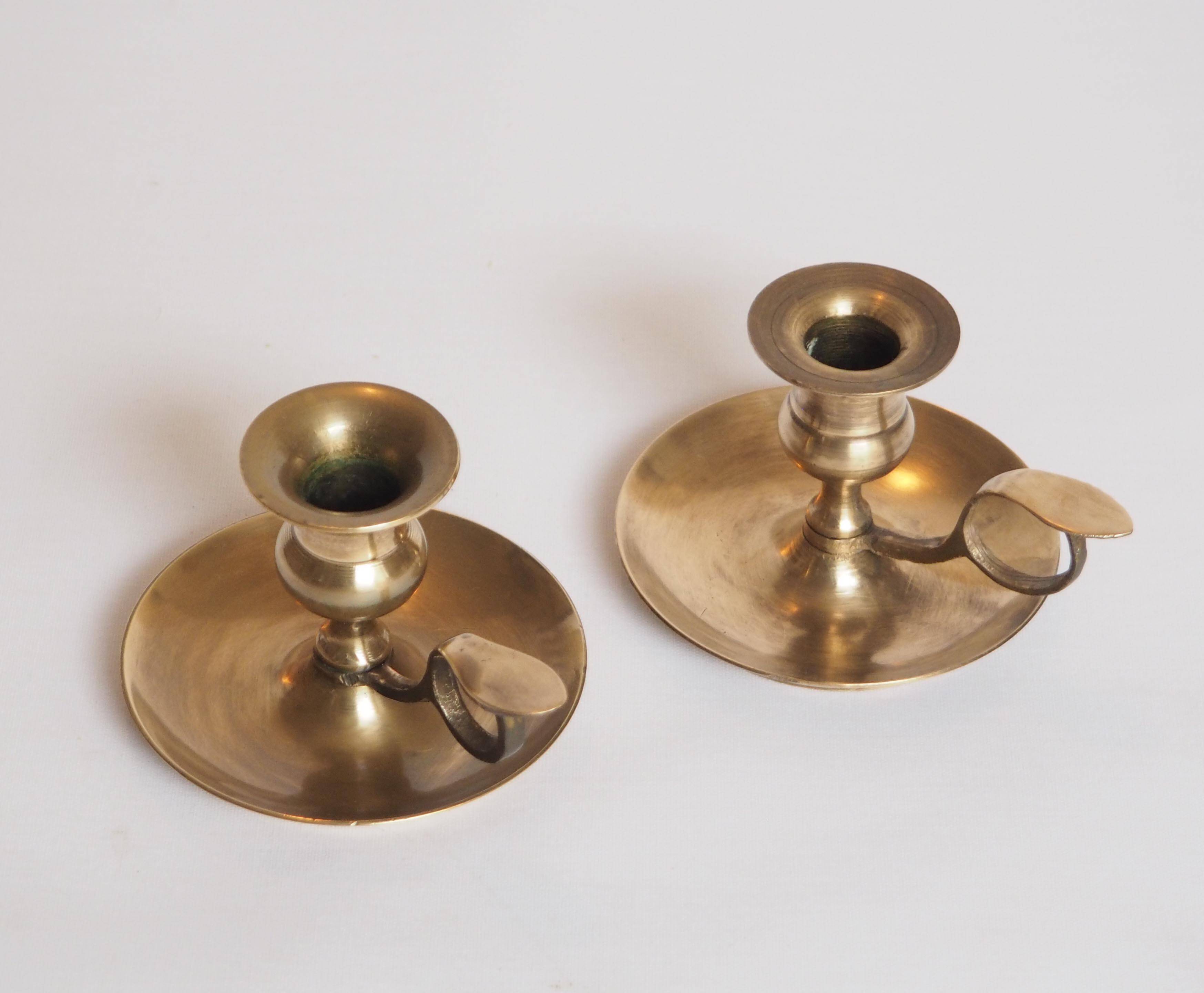 Brass candle holder with cup and handle