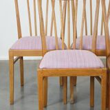 Set of 8 vintage Danish design dining chairs from the 1970s with light purple fabric seats