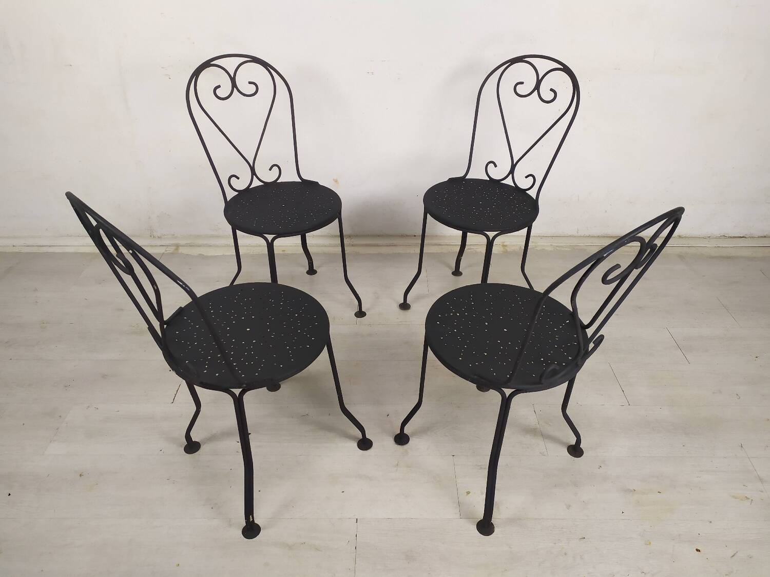 4 black garden chairs