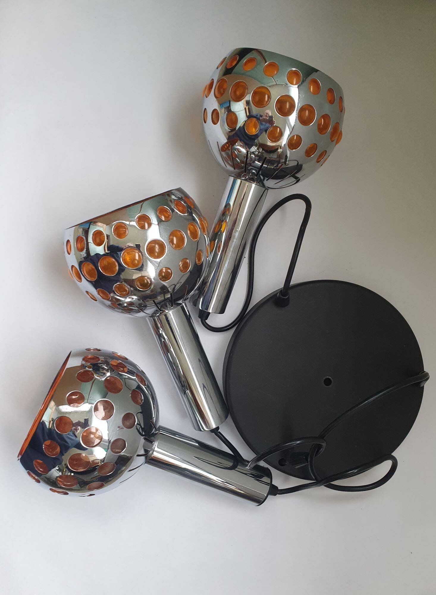 Raak three-light space age orange pendant lamp, 1970s, Netherlands