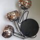 Raak three-light space age orange pendant lamp, 1970s, Netherlands