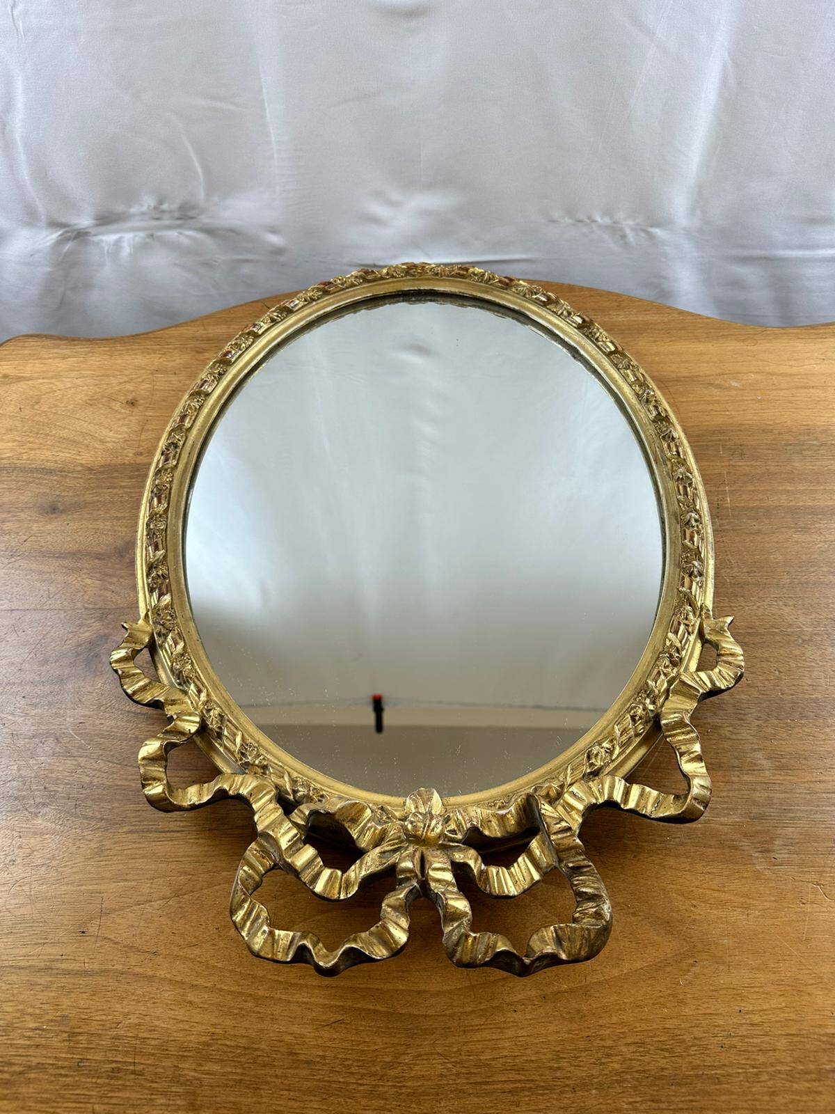 Louis XVI style oval mirror