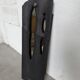 Brutalist hammered mirror, free-form, patinated metal.