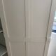 Vintage Parisian wardrobe painted in linen white, one door, three shelves