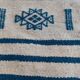 Traditional handmade white and blue kilim rug in natural wool