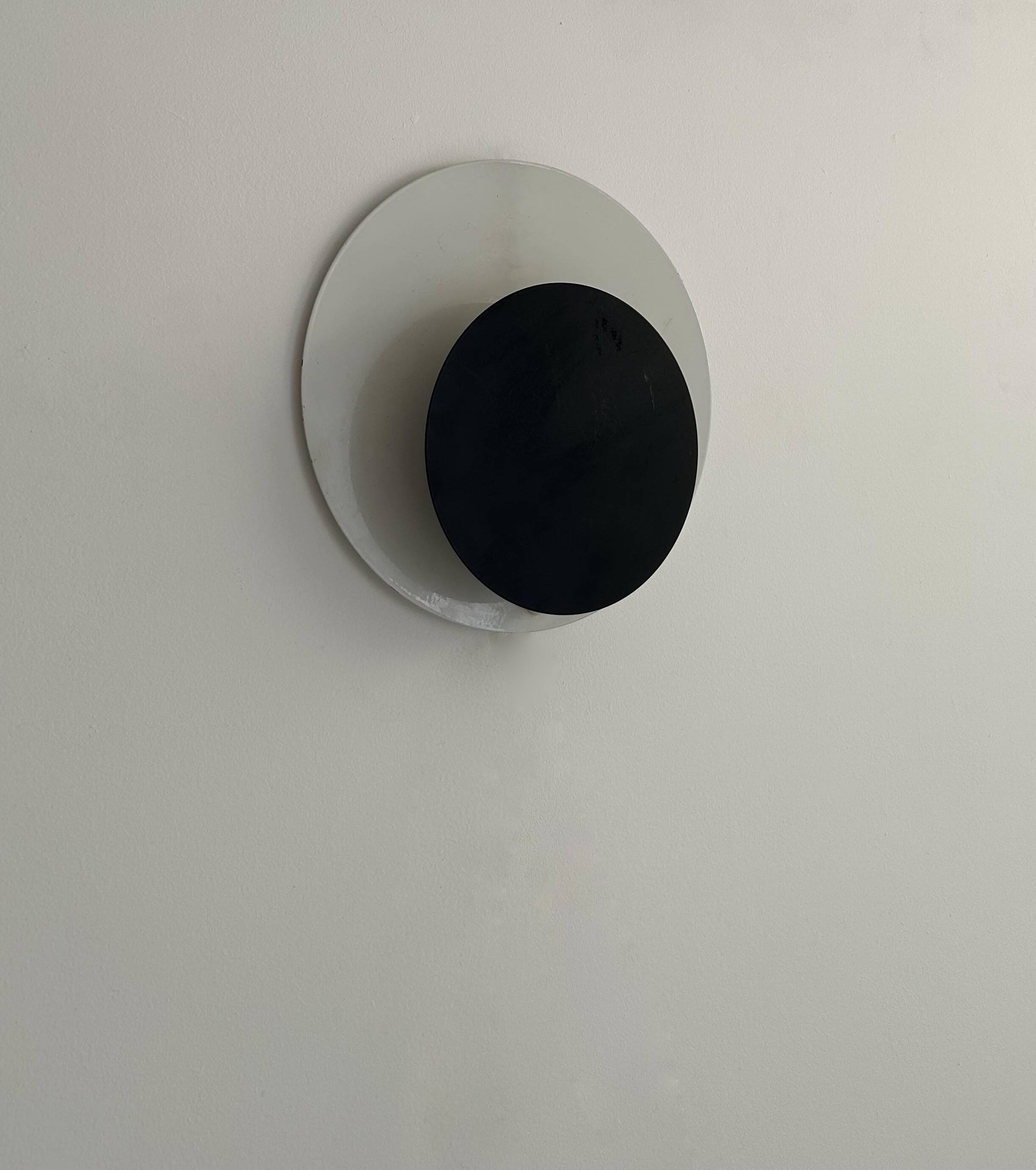 Vintage "Cirkle" wall lamp in black and white lacquered metal, Denmark 1970s