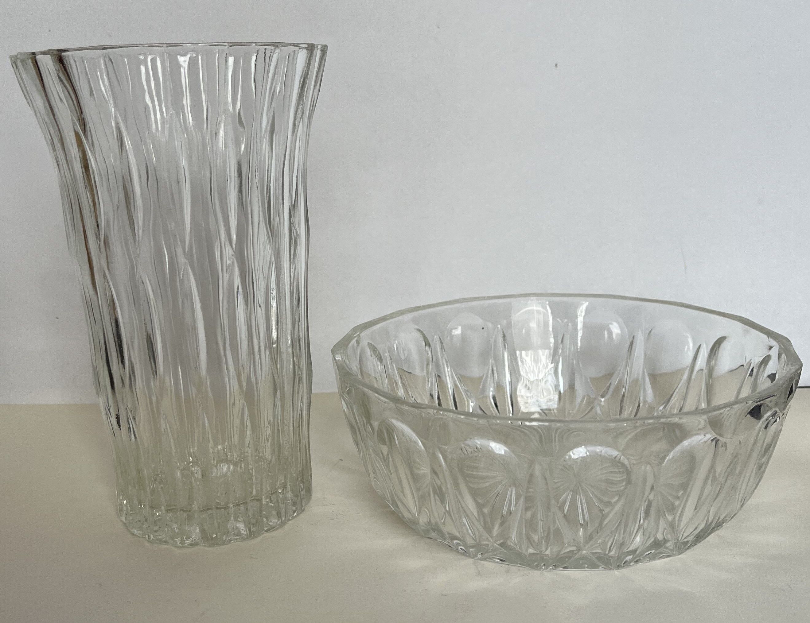 Cup and glass vase