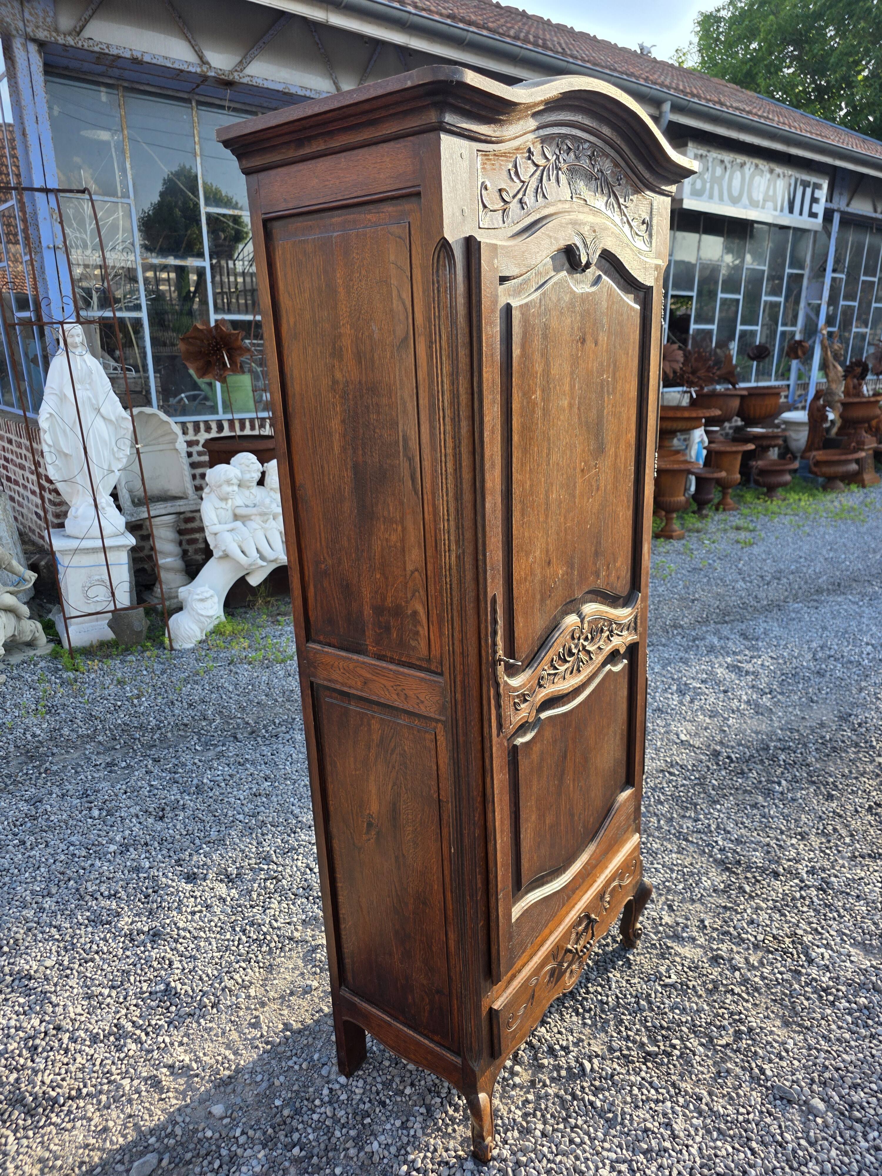 Louis XV style bonnetière in solid oak