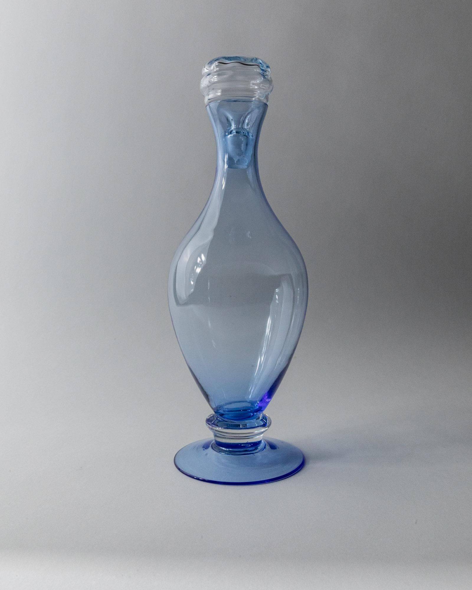 Set of 2 vintage Murano glass carafes from the 1940s, blue art glass with stoppers.