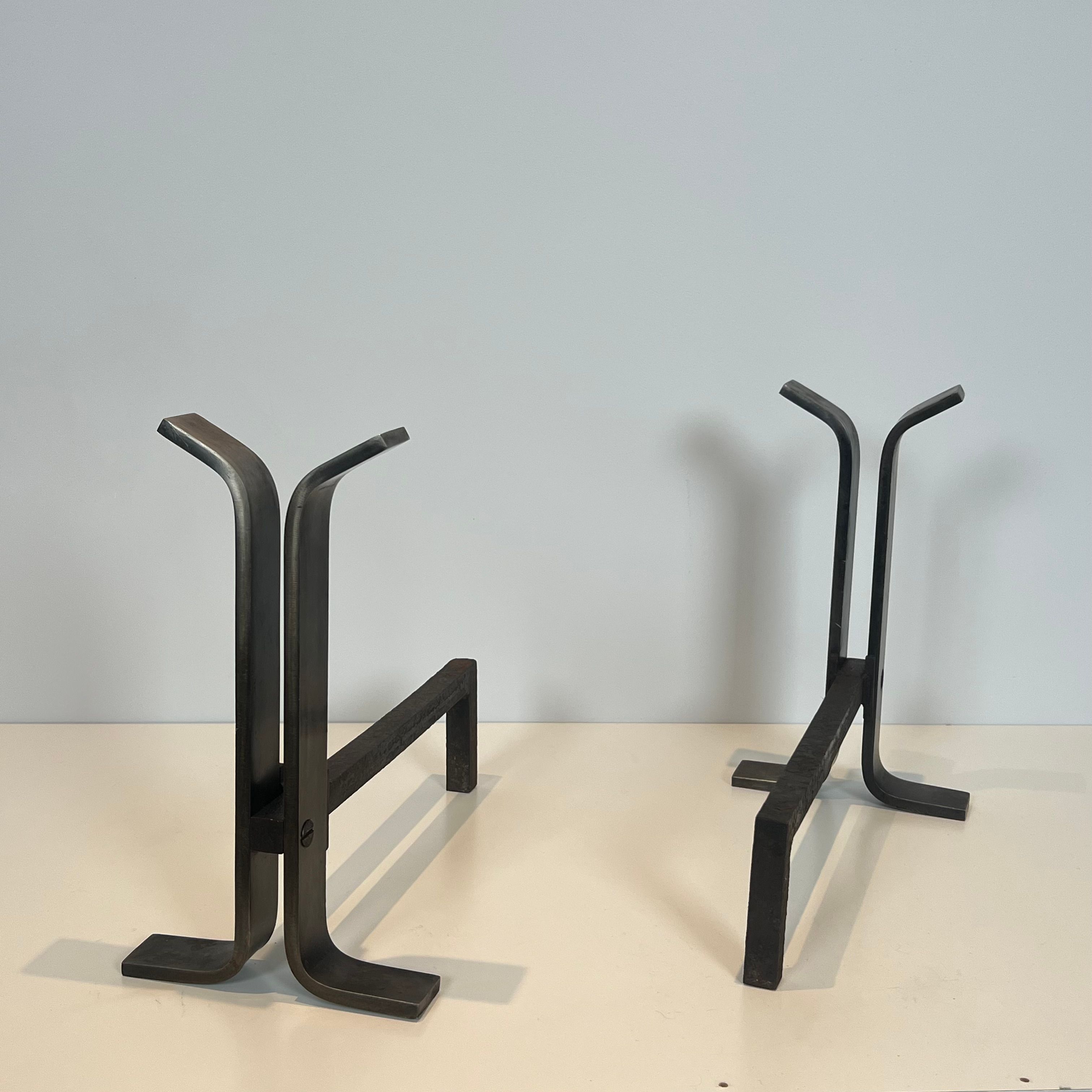 Pair of modernist and wrought iron fire dogs