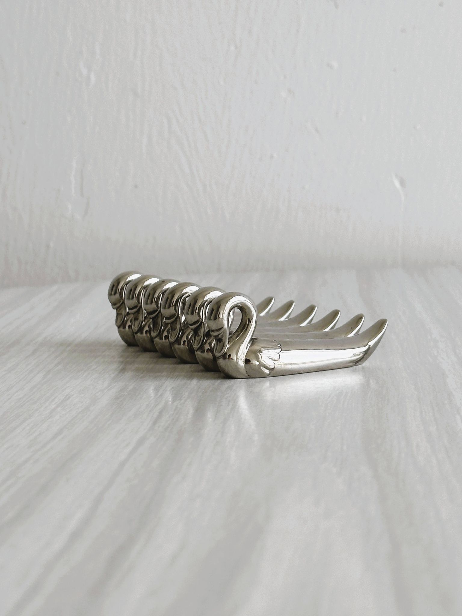 set of 6 silver metal swan-shaped knife holders