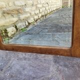 Art Deco oak mirror with bevelled glass from the 1930s.