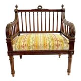 Old Louis XVI style armchair with wide seat