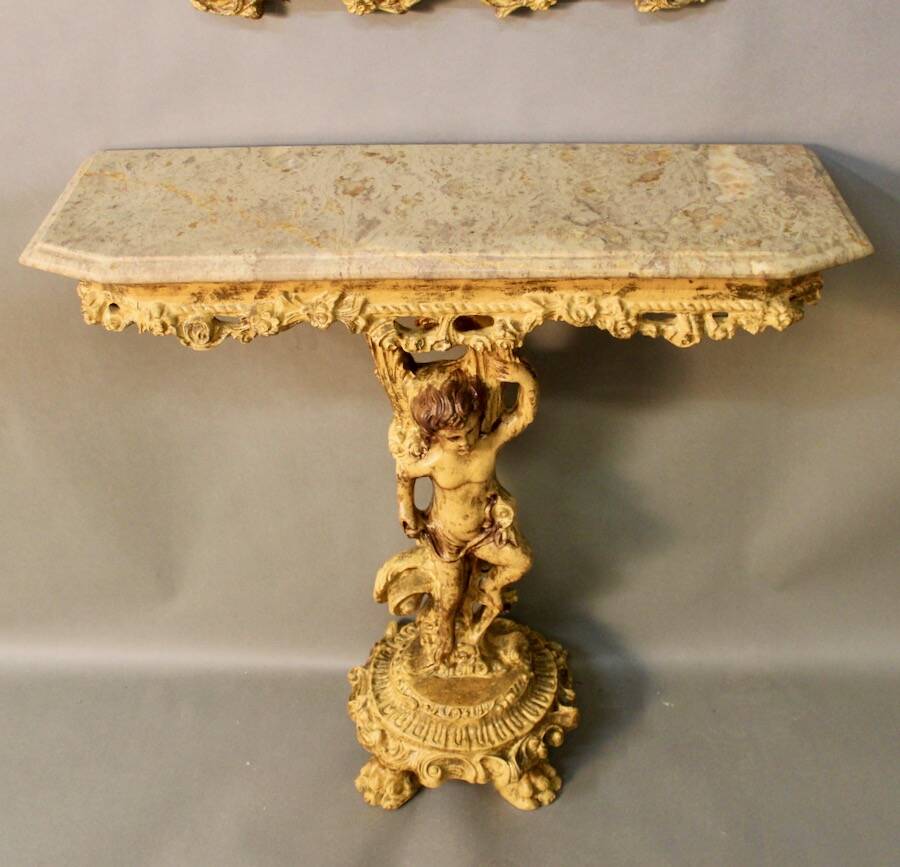 Marble top console and its rocaille style mirror