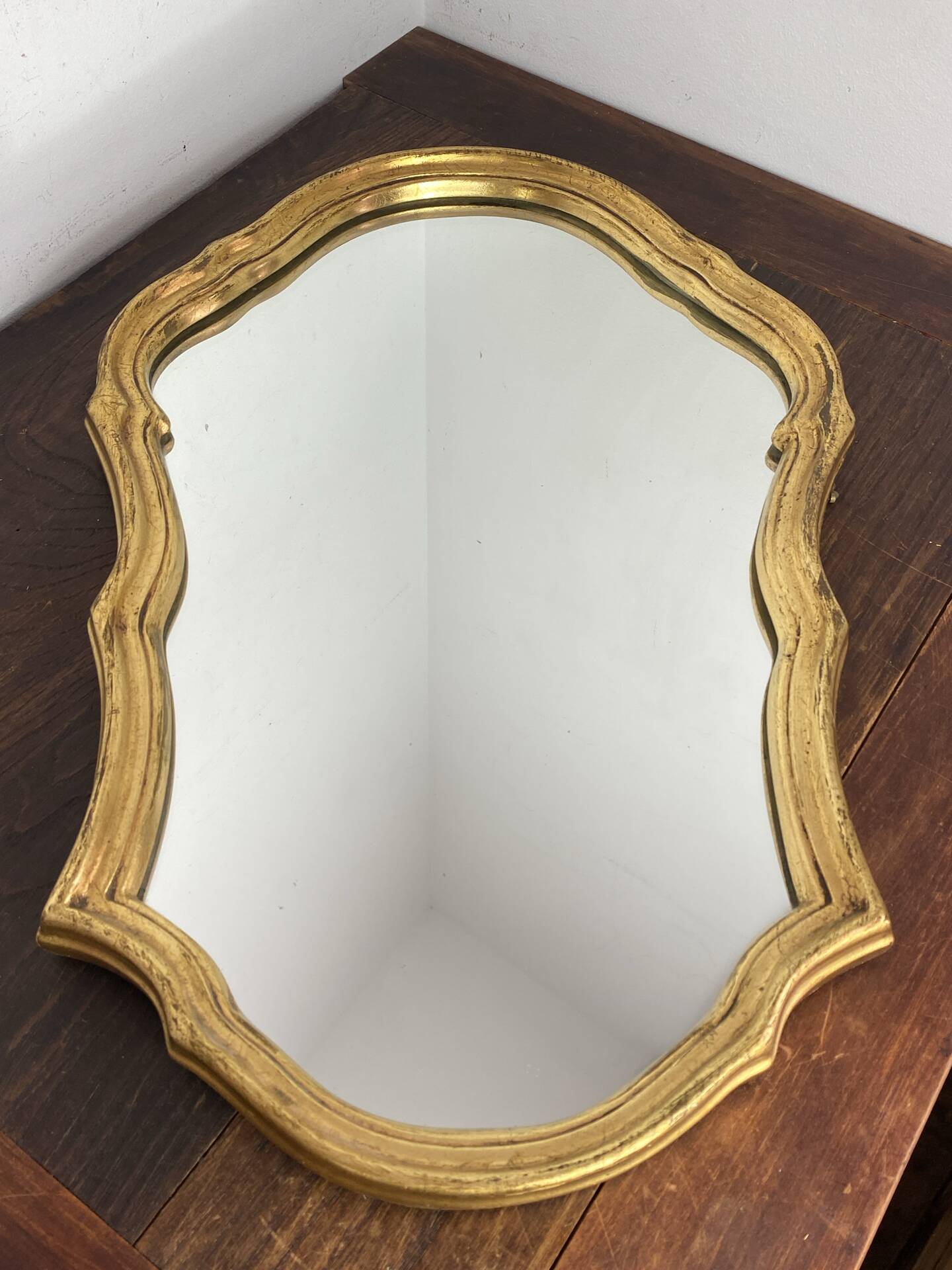 Large baroque mirror in gilded wood