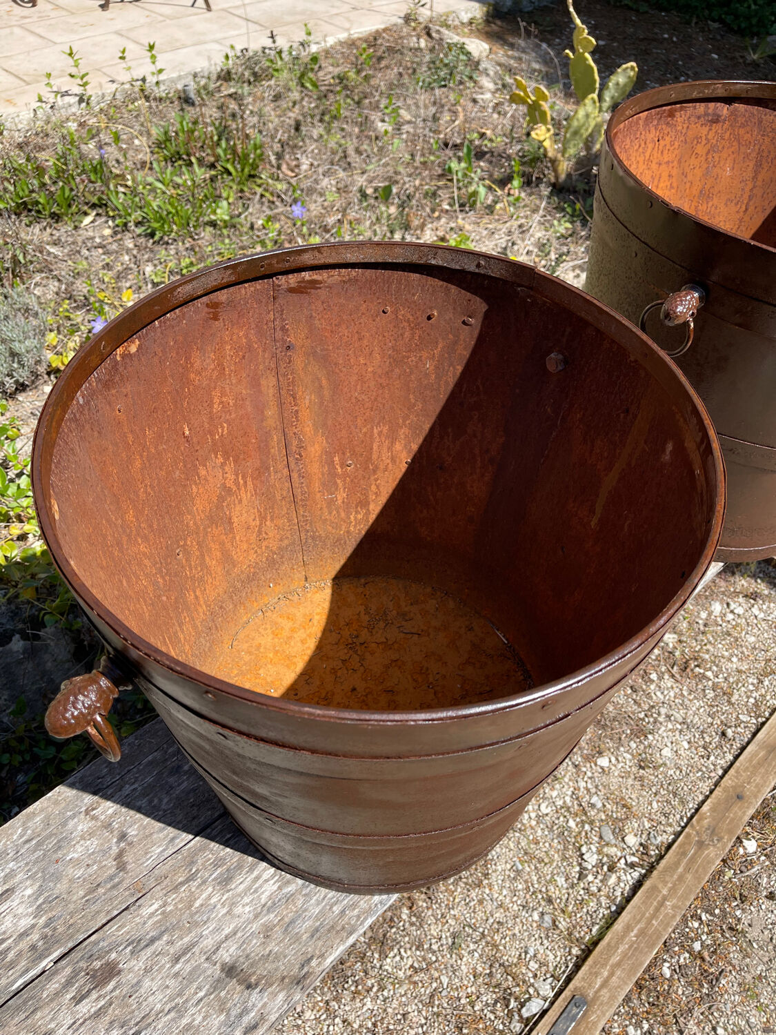 Riveted iron cache pots