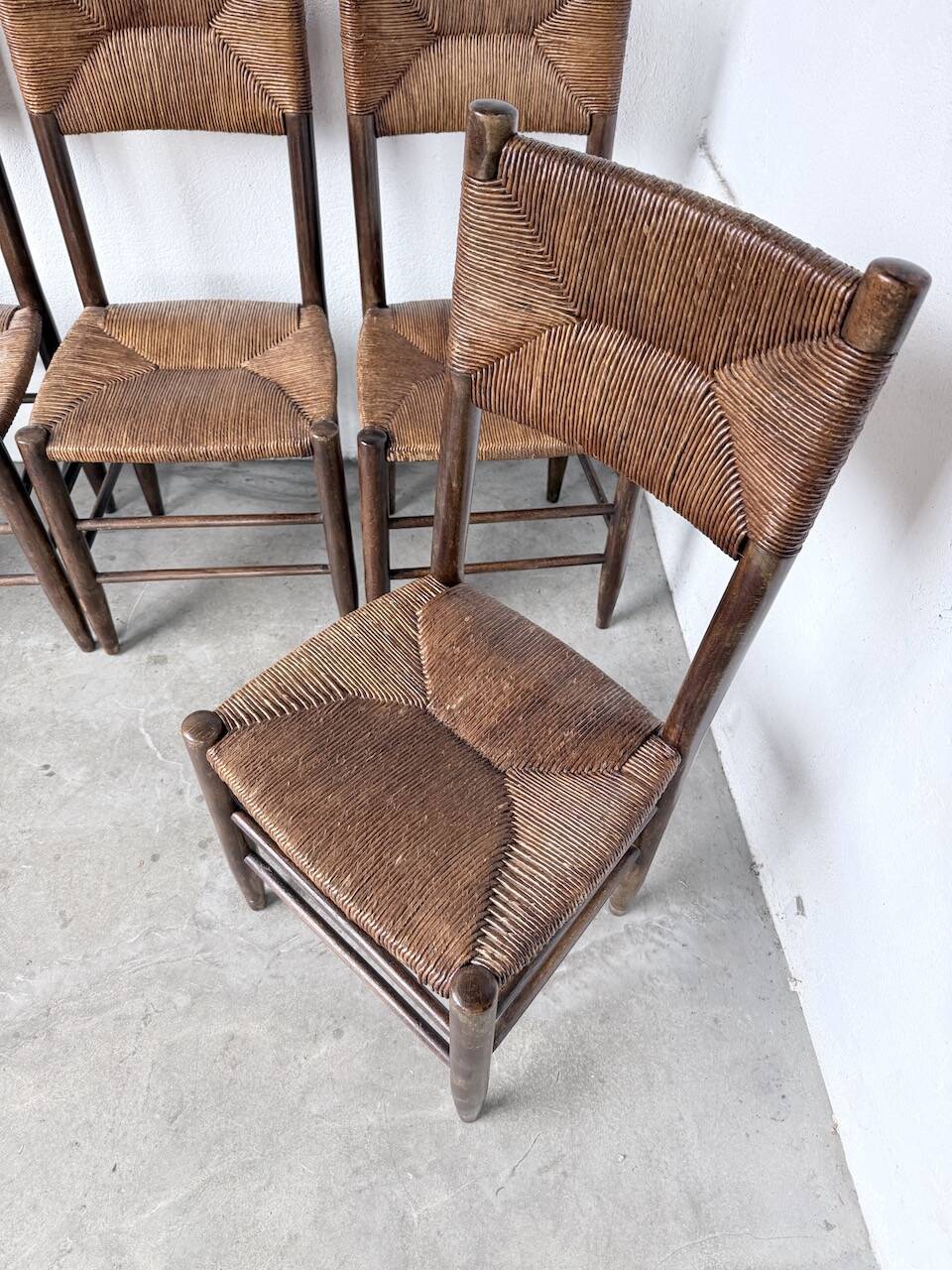 Set of 6 straw and oak Beauche chairs.
