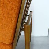 vintage orange armchairs