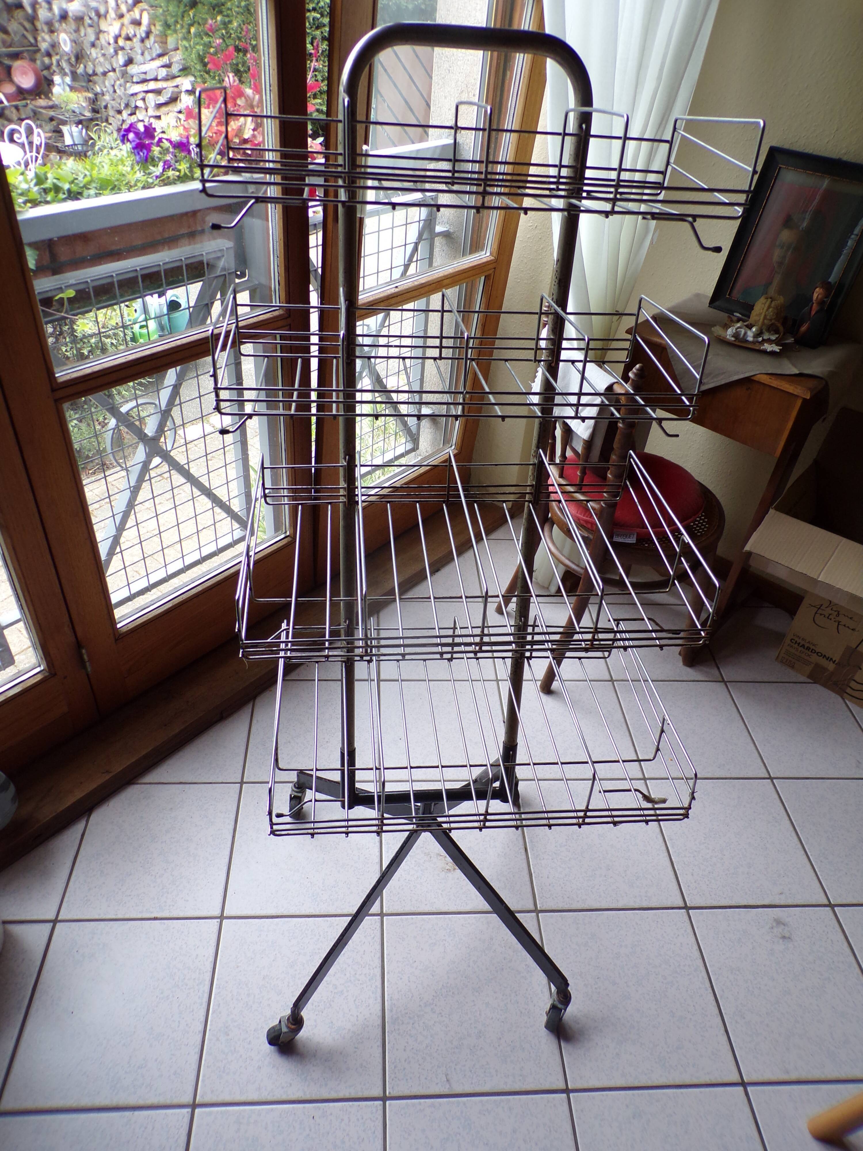 Metal grocery shelf on wheels