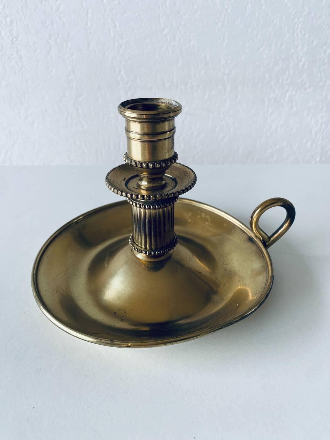 Candle holder with brass handle