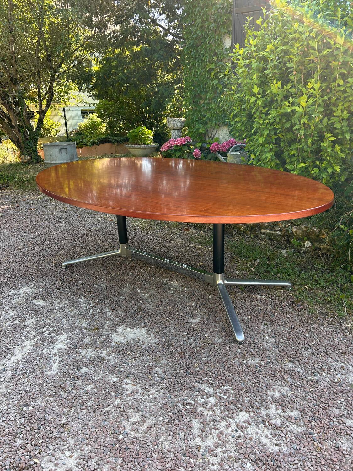 Vintage oval wooden and metal dining table from the 60s and 70s