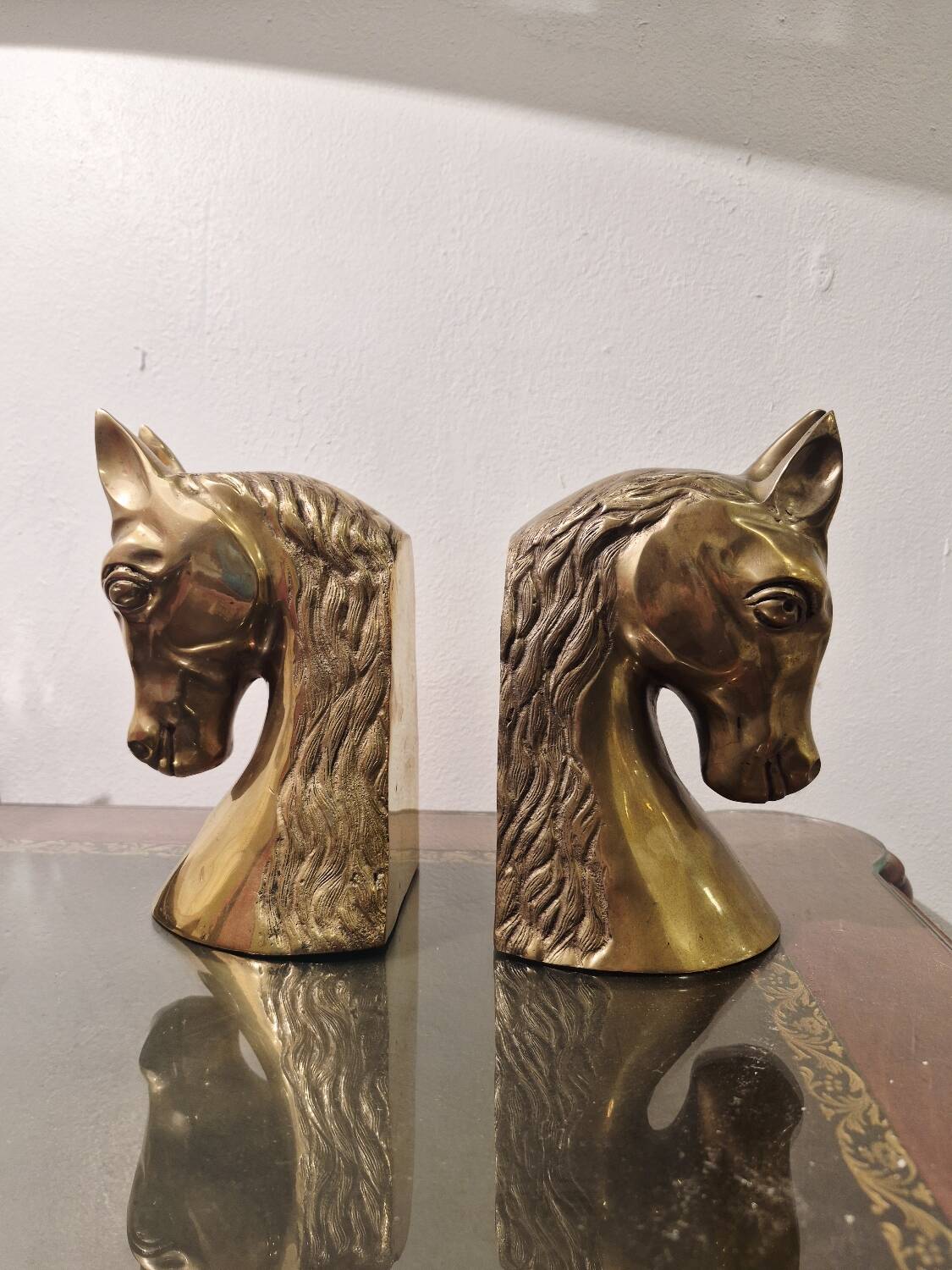 Serre livre têtes de cheval en laiton vintage